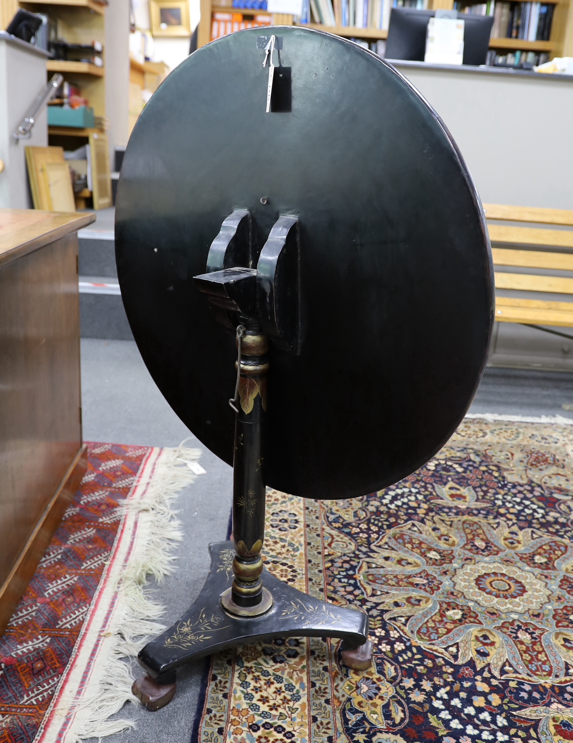 A mid 19th century papier mache circular tilt top table, diameter 83cm, height 78cm